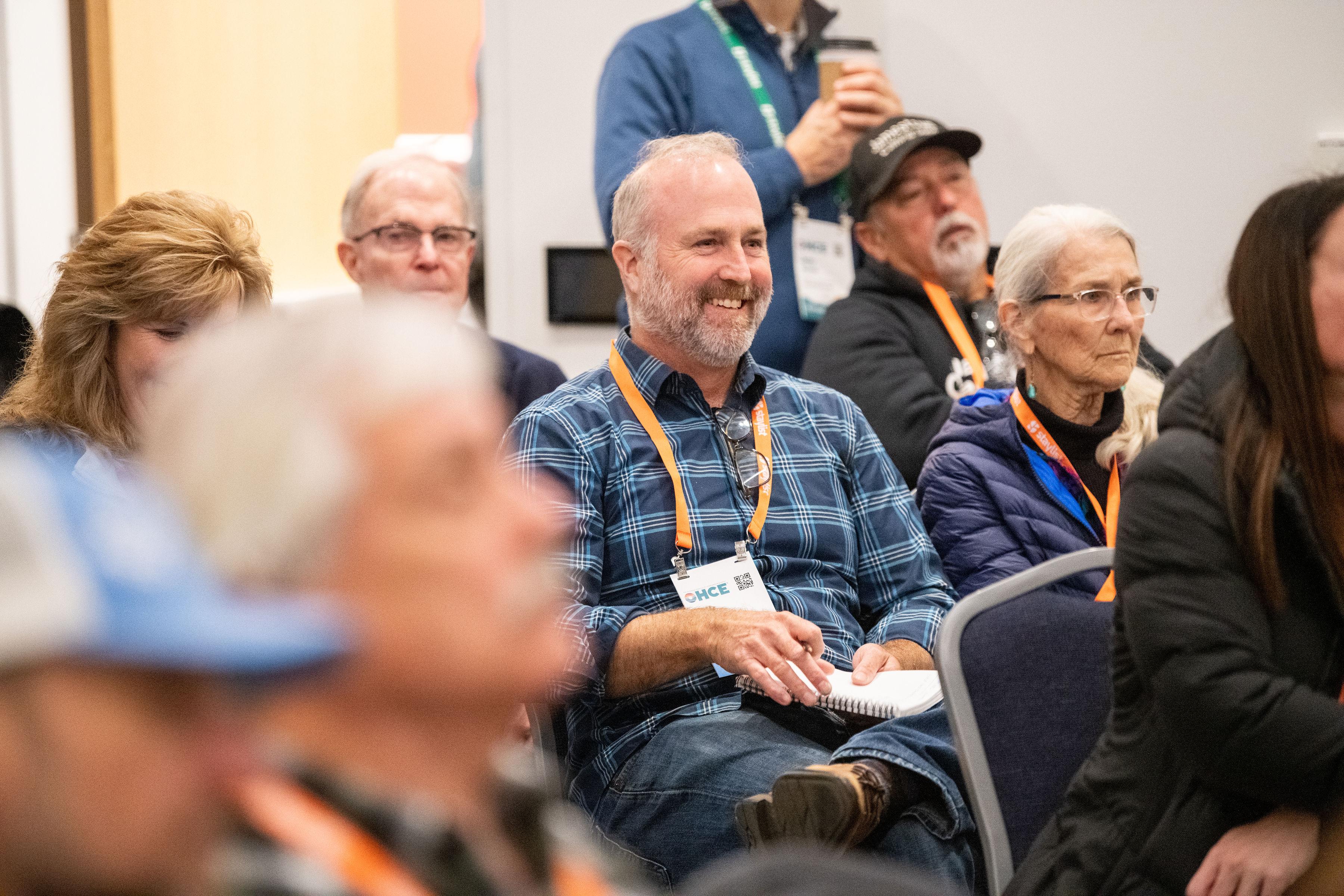 OHCE 2025 Attendee Erik Brown of Seal Rocks RV Cove Takes Note During a Break